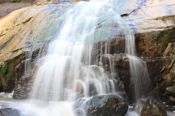 Fototapeta na wymiar waterfall in a small creak - Image
