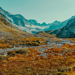 Scenic mountain scenery with cloudless skies. Wildlife. A paradise for climbers. Daylight time. hiking