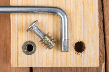 Special screws for joining wood. Carpentry accessories for building furniture.