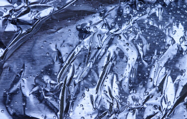 Blue metallic background with water drops (lightly striped texture)