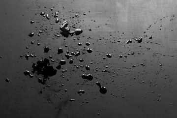 drops of water on a black panel