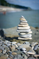 Rock stone zen tower sculpture with shallow depth view