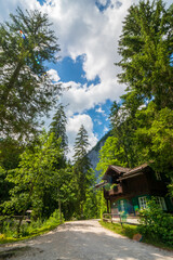 Fototapeta na wymiar Old wooden forester's lodge at the lakeshore of the legendary Lake Toplitz, Ausseer Land region, Styria, Austria