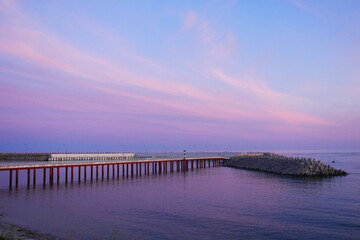 Fototapeta premium Red and blue sunset over the evening sea