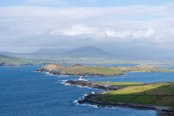 Beautiful view of Valentia Island Lighthouse at Cromwell Point. Locations worth visiting on the Wild Atlantic Way. Scenic Irish countyside on sunny summer day, County Kerry, Ireland.