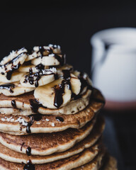 Vegan banana pancakes with chocolate syrup