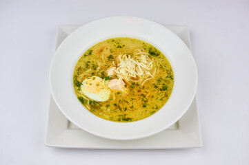 soup noodles with egg and herbs on a dark background lake