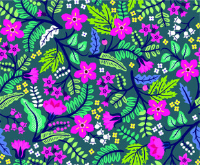 Seamless floral pattern for design. Small multicolored flowers. Dark blue background. Modern floral texture. A allover floral design in bright colors. The elegant the template for fashion prints.