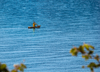 Fototapeta premium yellow kayak on the atitlan lake