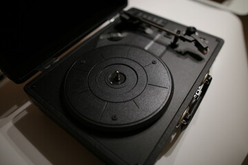 Retro vinyl record player. Vintage Gramophone. Black vinyl player.
