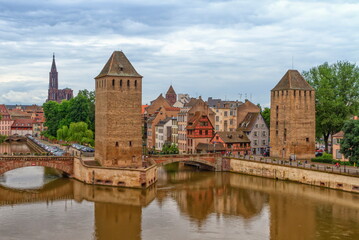 Fototapeta na wymiar The twin watchtowers of the Ponts Couverts by day, Strasbourg, France