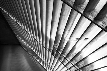 Obraz premium rays of light through the hangar, vintilention window