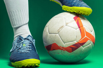 close up of isolated soocer feet player with a soccer ball