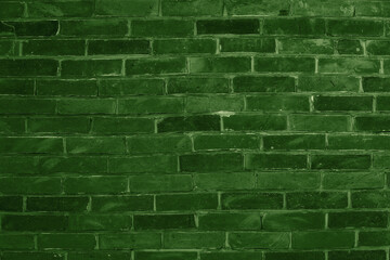 Green brick wall background inside of the room.