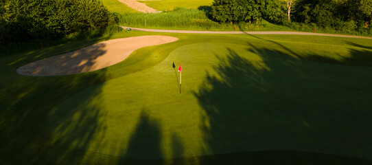 Golf course fly over green. Gold course Holzhaeusern, Switzerland