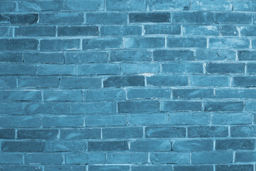 Blue brick wall background inside of the room.