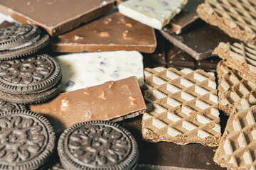 heap of chocolate, round . All sprinkled with cocoa. World Chocolate Day.