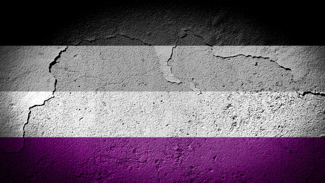 Asexual pride flag on cracked wall