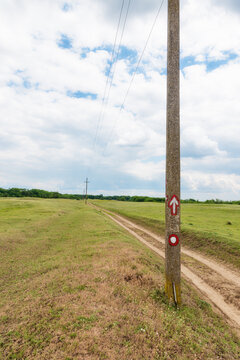 Country road at springtime day, Deliblatska pescara, Serbia. The place where the legendary Serbian film "Ko to tamo peva" was shot.