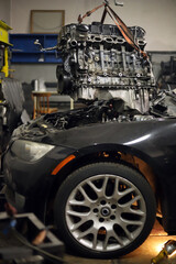 The process of installing a repaired engine on a car