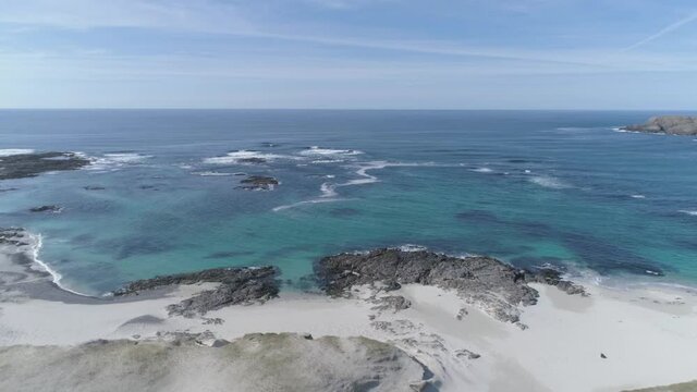 Isle of Barra, Scotland, Hebrides. Coastline, water and waves. Ocean turquoise water.