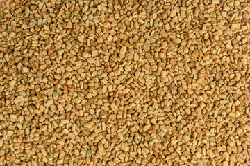 Helba seeds. Fenugreek on a white background. Healthy herb. Нelba. Fungere. Fenugreek. 