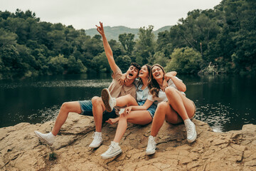 Group of young people in a lake.