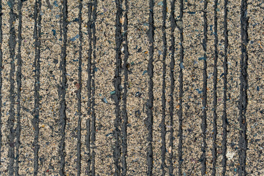 cracks of tar in the cement