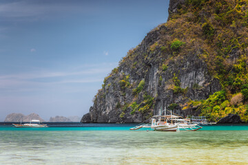 Boat in lagoon of Corong beach in El Nido, Palawan Island, Philippines