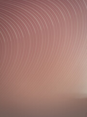 Light striped background. Backdrop in retro colors. Curved lines. Simple wallpaper pattern.