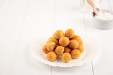 COpy Space Kue Nastar or Indonesian Pineapple Tart Cookies Stuffed with  Pineapple Jam. Made from Flour, Egg, Butter, and Sugar. Popular for Hari Raya Lebaran and Christmas. Selective focus