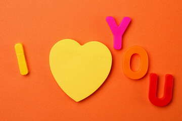 Confession I love you with a blank sticker in the shape of a heart instead of the word love. Copy...