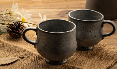 a cup on wood table background, hot tea
