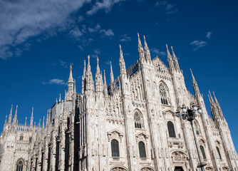 Fototapeta premium Milan Cathedral with its golden Madonnina.