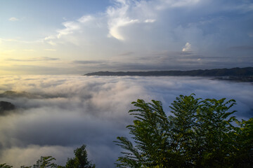 Sea of clouds over hills in Mangunan, Yogyakarta, Indonesia.