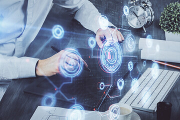 Multi exposure of man's hands holding and using a digital device and data theme drawing. Innovation concept.