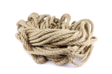 A jute rope isolated on a white background. A hemp rope. A linen cord isolated