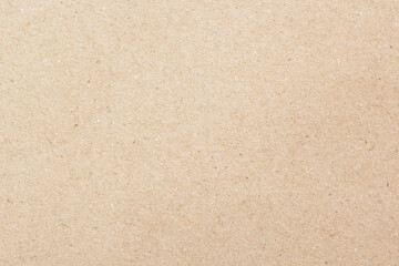 Fototapeta na wymiar Brown paper background. Empty cardboard texture. Craft sheet