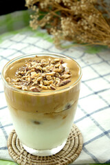 Dalgona Coffee, Coffee with milk with Almond nut on top in Korean Style