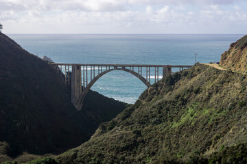 View from behind the scenic Bixby Bridge looking out over the Pacific ocean in Big Sur, Califonria