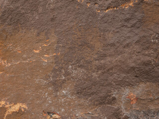 old brown stone wall ,dark  pattern background stone texture. cement stucco plaster stone texture grain.