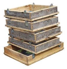 Homemade boxes with steel mesh for sifting sand in a rural construction site isolated