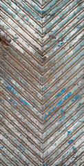 The door of the old country house is made of diagonal planks
