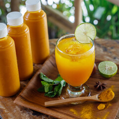 Bottles and a glass of Jamu 