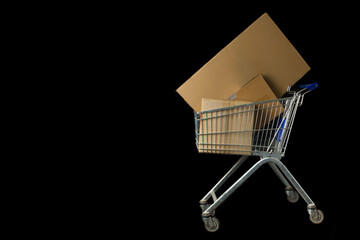 shopping cart with cardboard boxes. Delivery to the consumer,