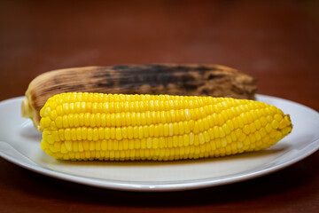 Grilled corn, one of the typical street foods in thailand.