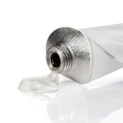 White open tube with leaked clear liquid