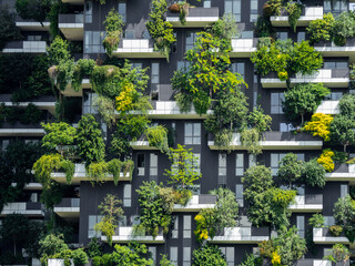 Milano, Italy. Bosco Verticale, a close up view at the modern and ecological skyscrapers with many...