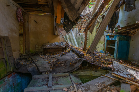 Broken interior of a village house in the Chernobyl Exclusion Zone in the Ukraine