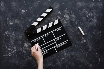 Filmmaking concept. Movie Clapperboard. Cinema begins with movie clappers. Movie clapper board on a...